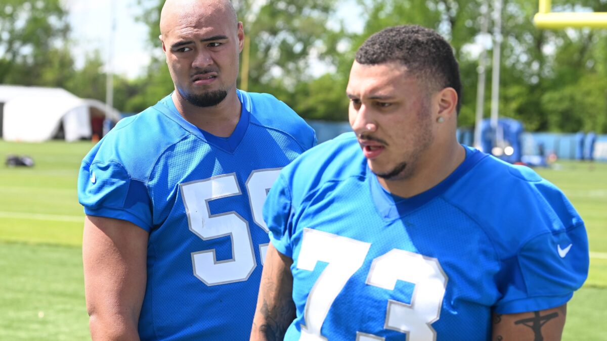 Young offensive lineman practicing pass protection technique
