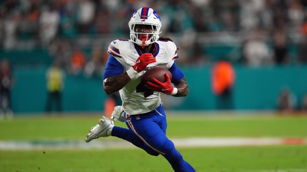 Running back helping protect the quarterback against a blitz