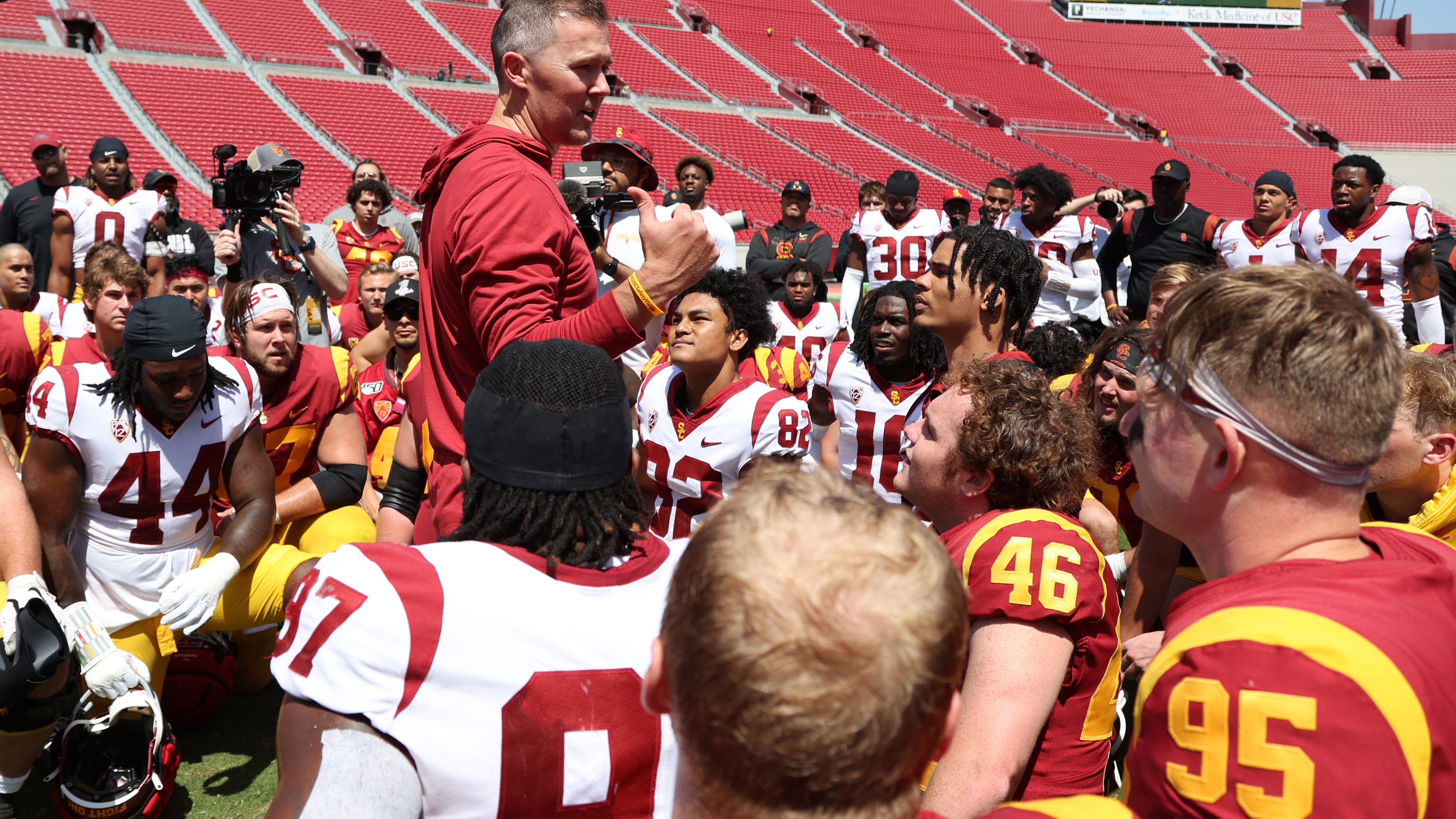 College football walk-on players participating in team practice