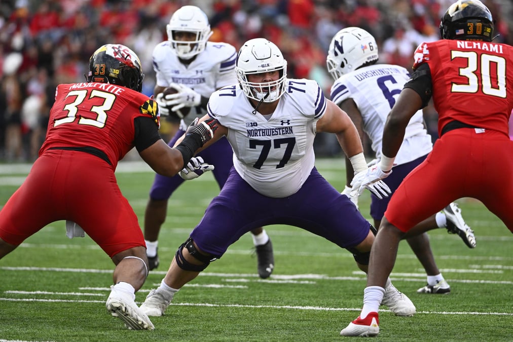 Five-man defensive surface challenging an offensive line in pass protection