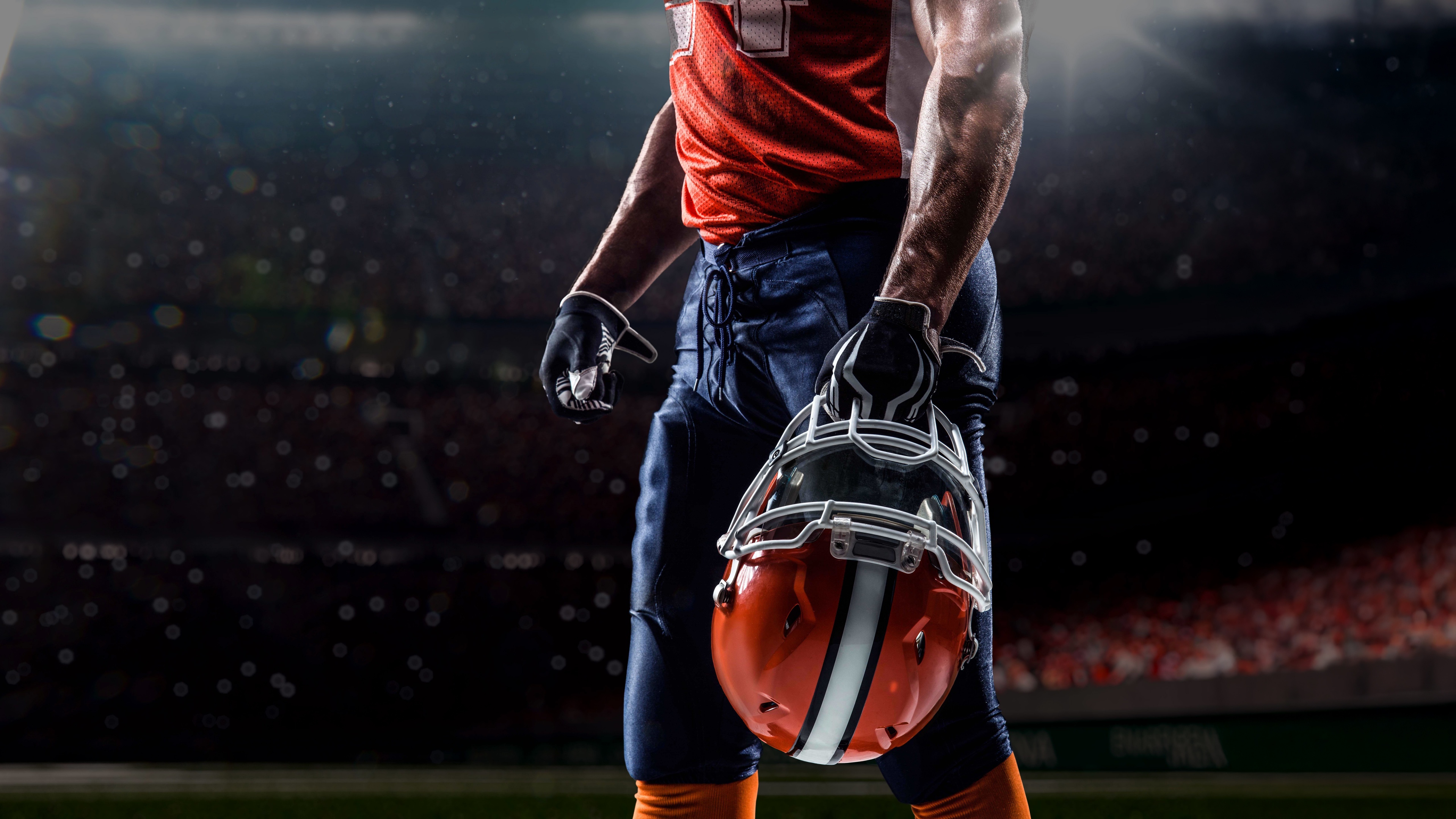 American football player wearing a helmet during a game