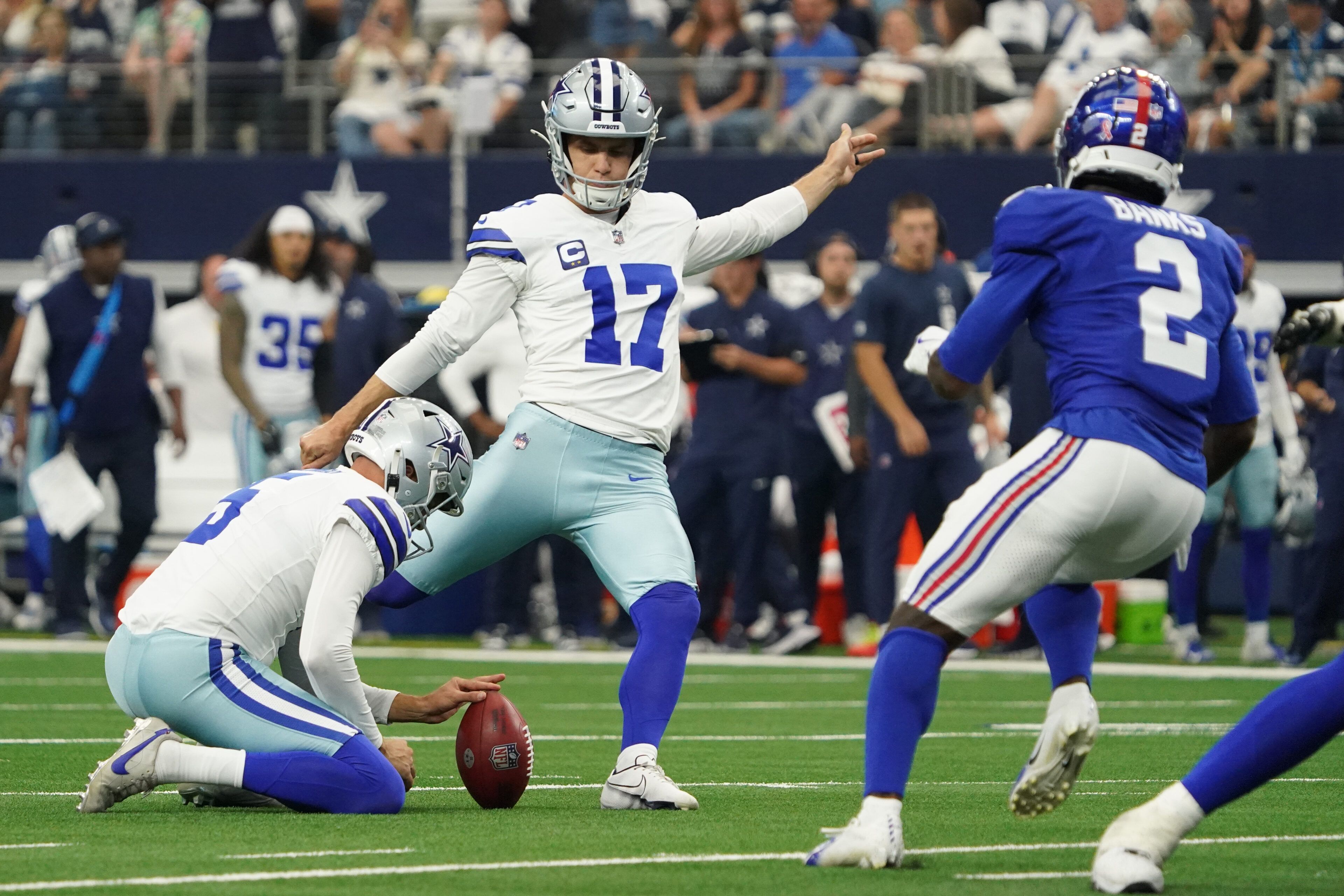 NFL kicker attempting a long field goal