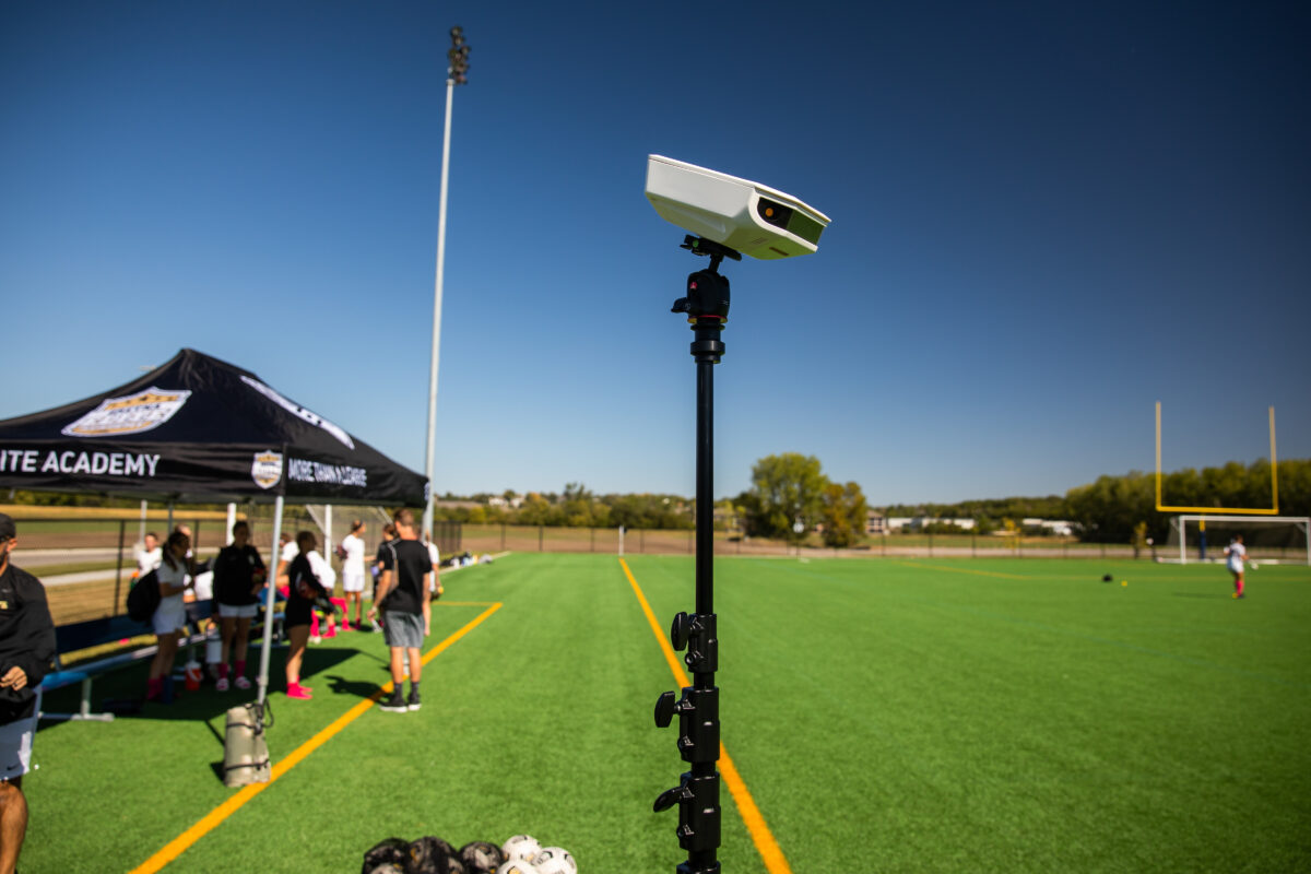 Replay officials reviewing multiple camera angles of a football play