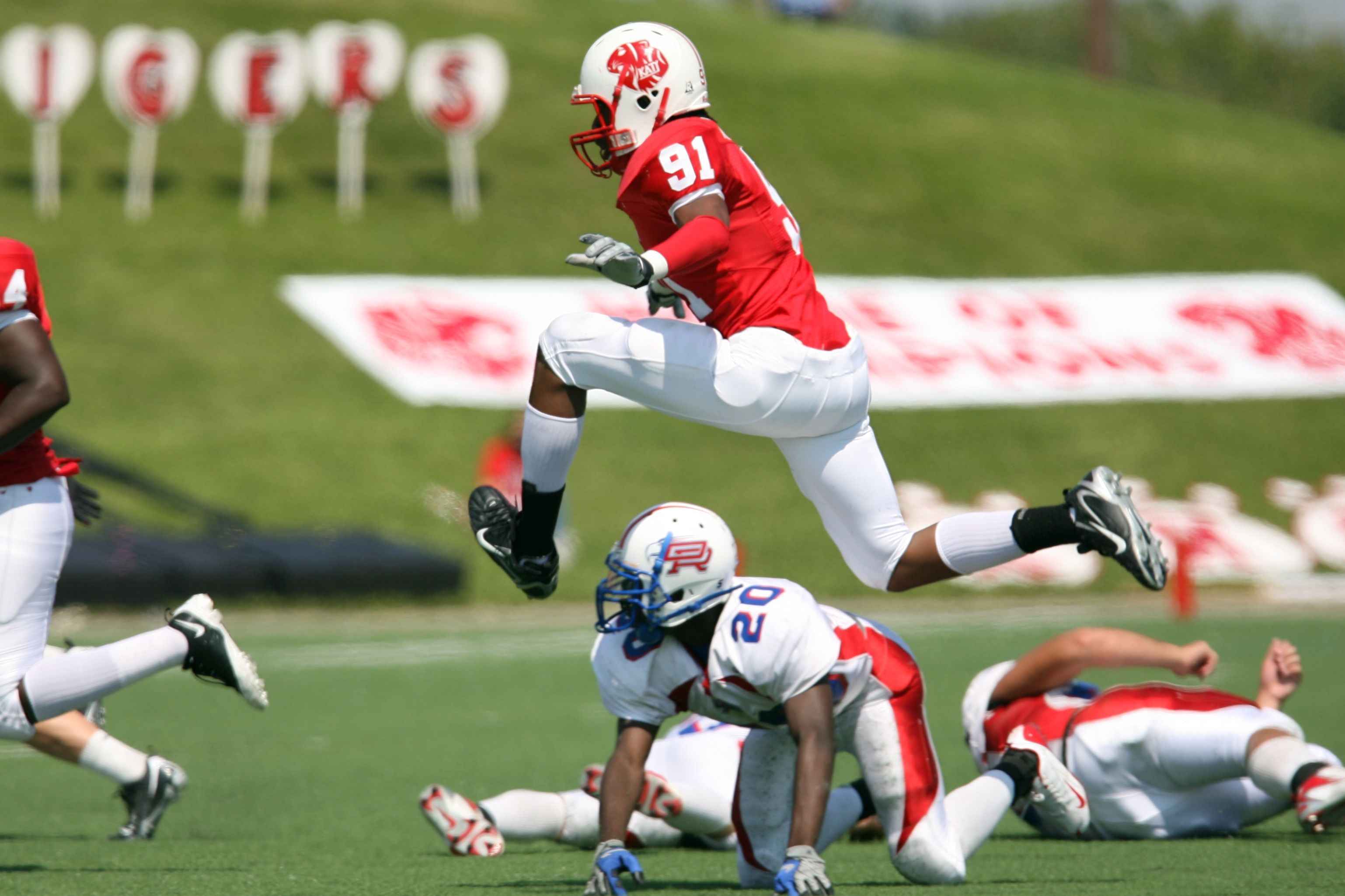 American football player scoring a touchdown
