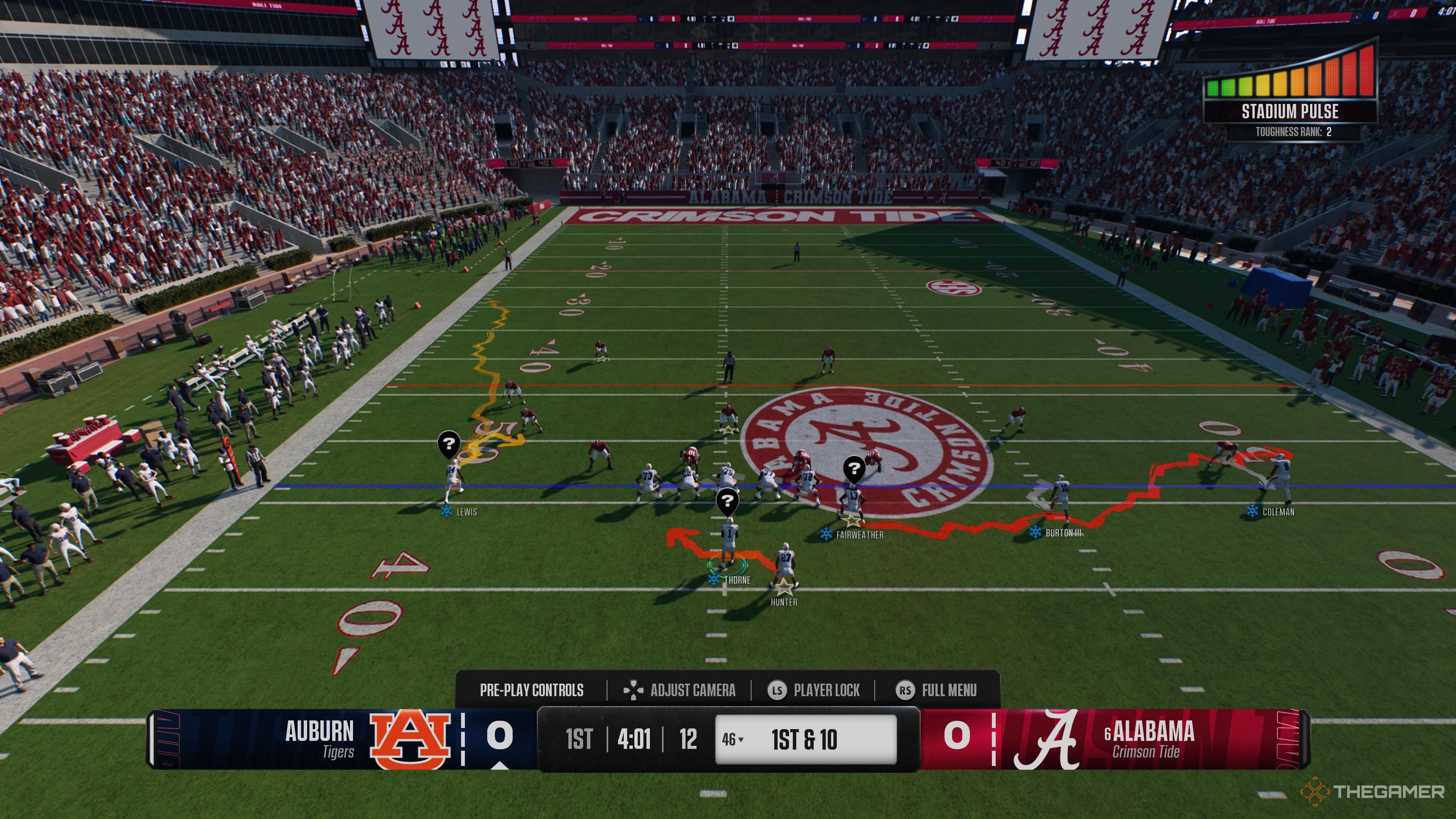 College football targeting review shown on a stadium replay screen