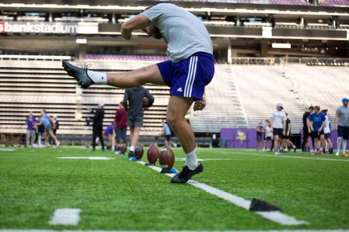 Kicker delivering a directional kickoff in American football
