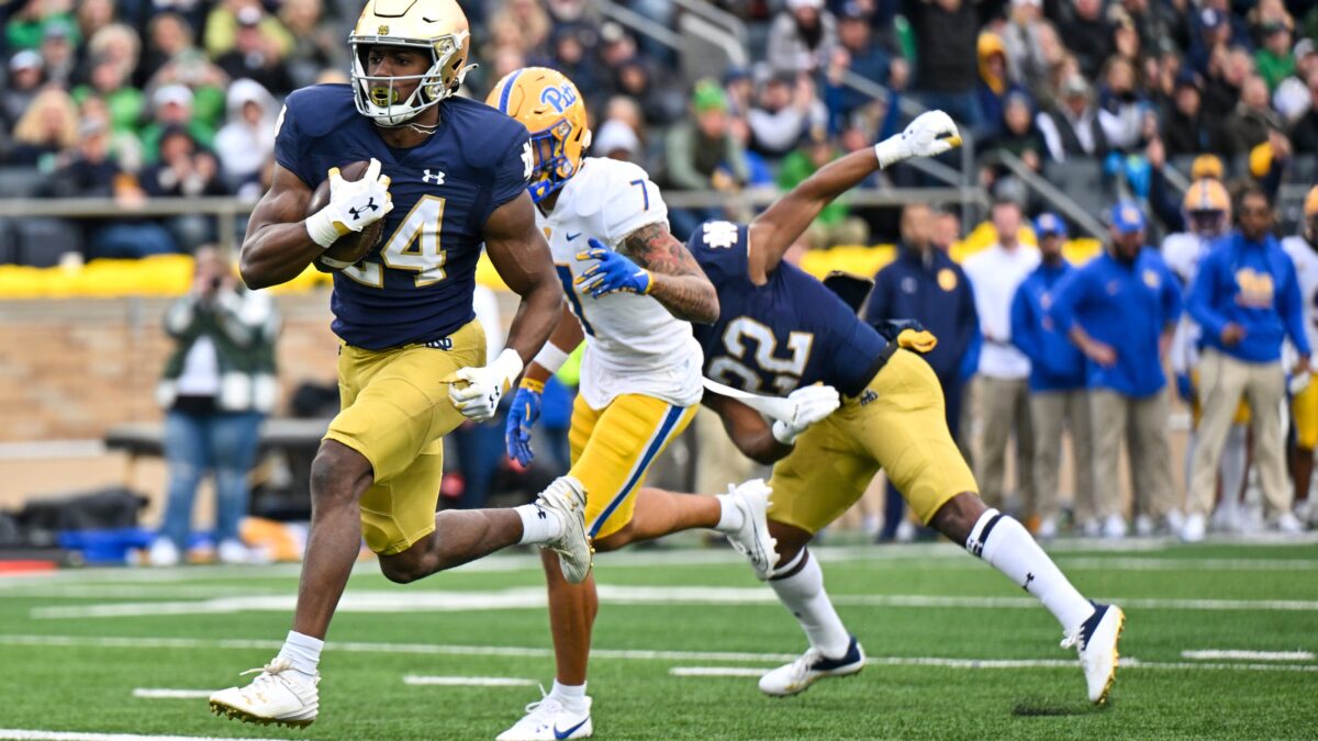 Running back navigating a rushing lane in American football