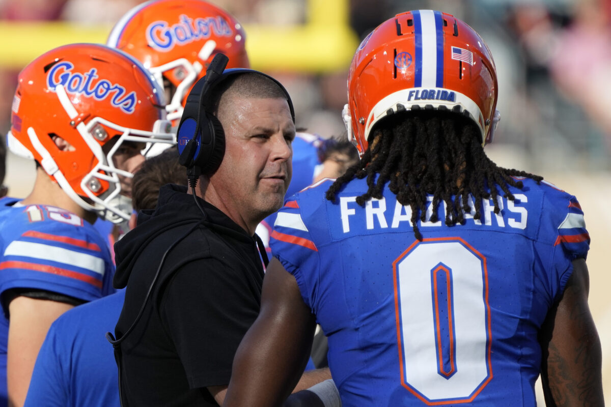 Coach considering a fourth-down decision during an American football game