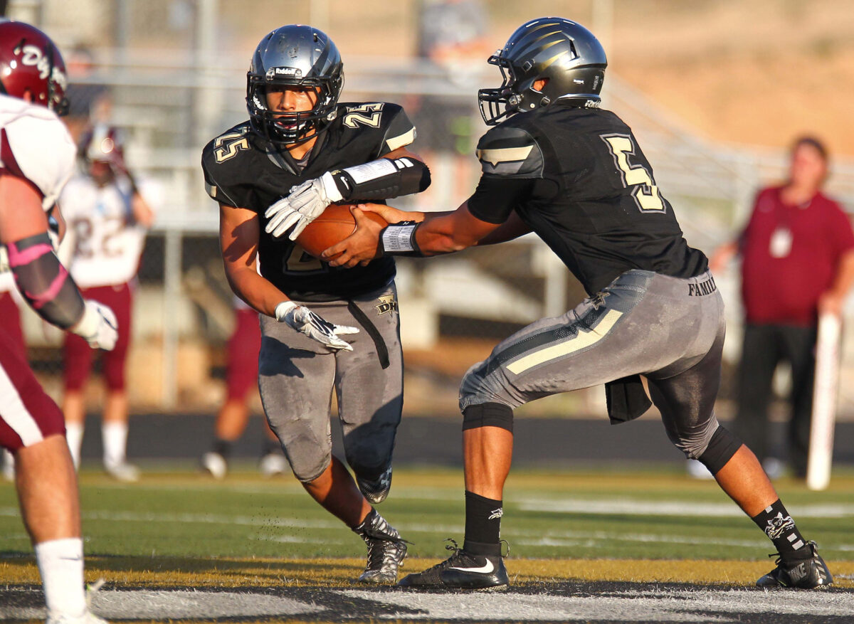 Running back reading an outside-zone cutback lane