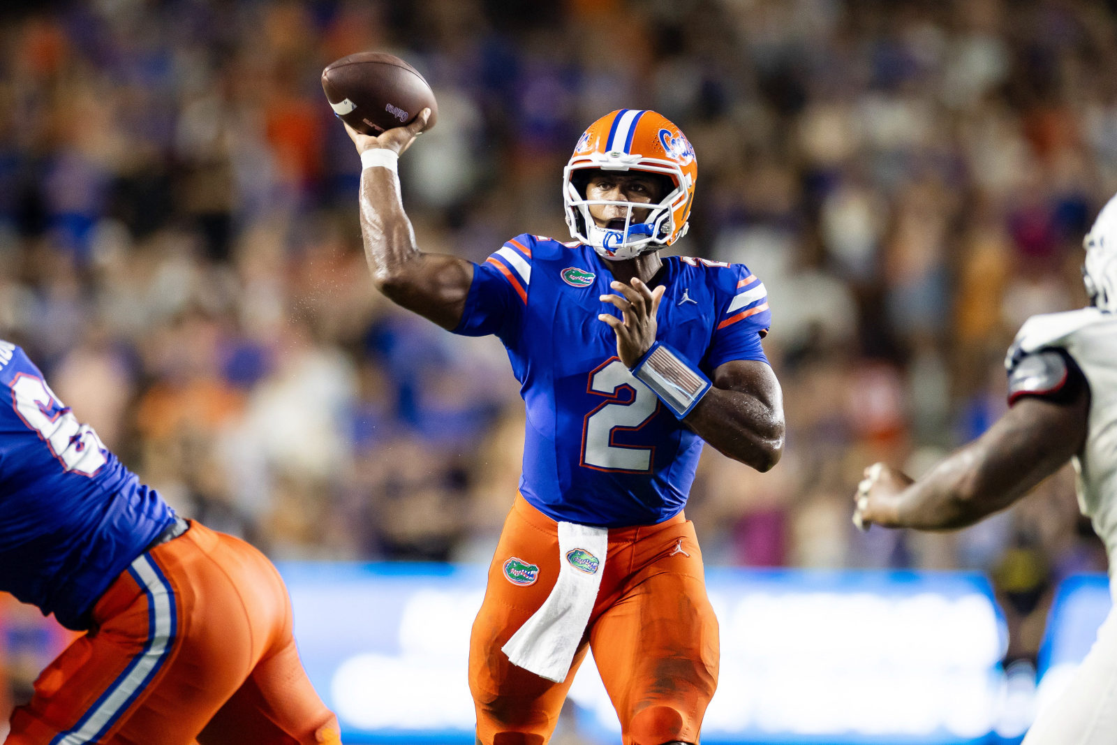 College football players taking part in spring practice drills