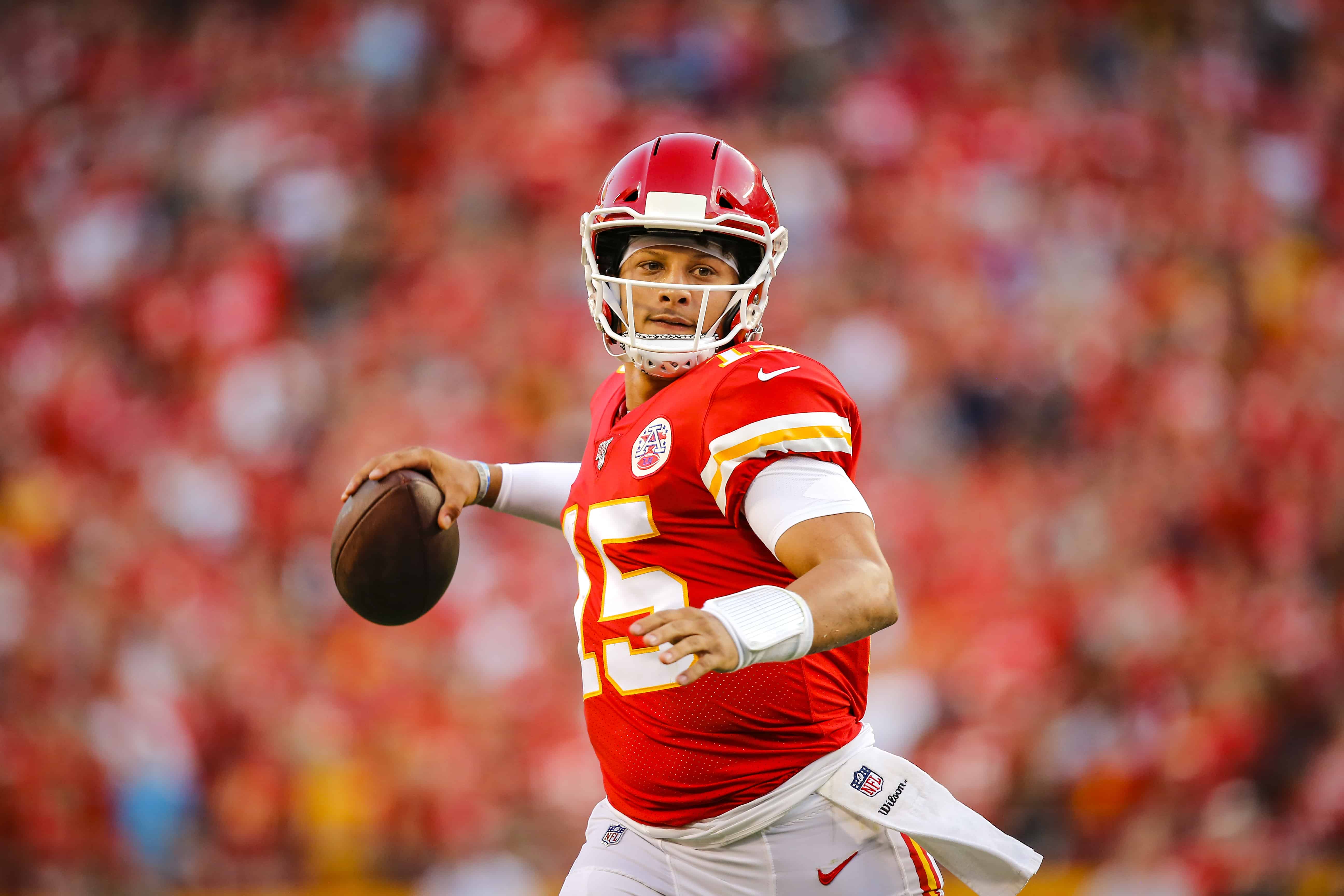 Quarterback rolling outside the pocket on a bootleg pass