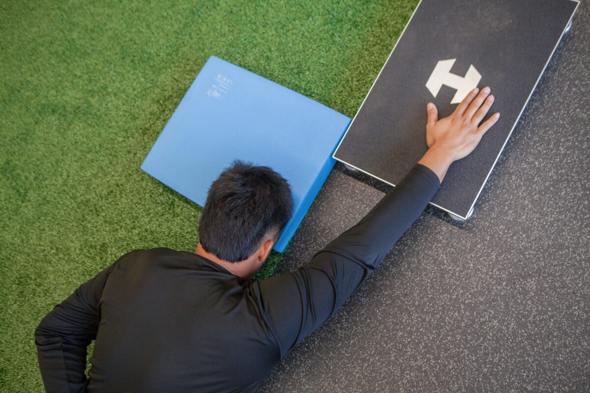 Football athlete performing a force plate jump test